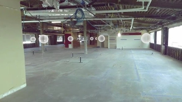 photo of the laser scanned environment showing laser positions in the building shell.
