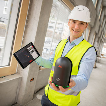 construction guy holding a Leica BLK360 and a tablet showing the scanning locations.
