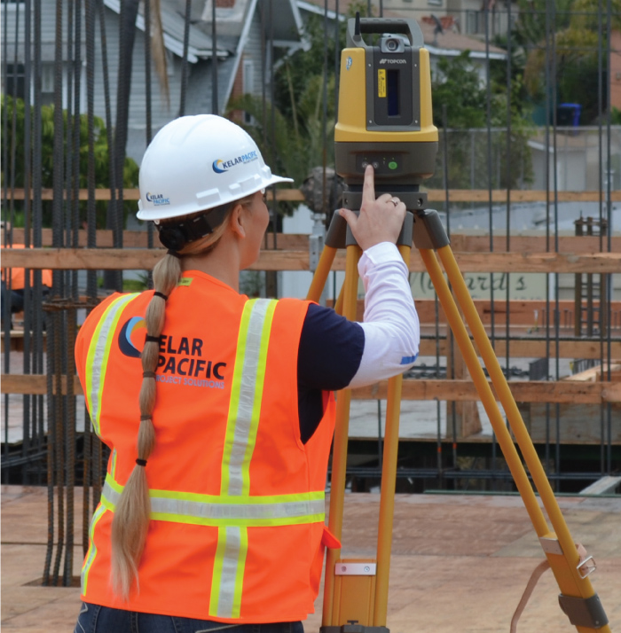 Kelar Pacific field team setting the automatic leveling on the robotic total station for point layout.